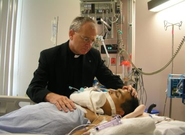 Br Richard standing in the fire