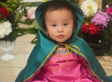 The youngest parishioner of Holy Spirit Church, San Luis Rio Colorado, Mexico. Fr Rudy Valenzuela, fsp, Pastor.